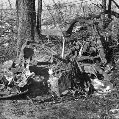 Halltown dynamite truck explosion - truck pieces wrapped around a tree