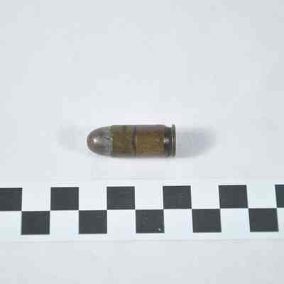 A 7.65 X 20 mm Longue rimless cartridge