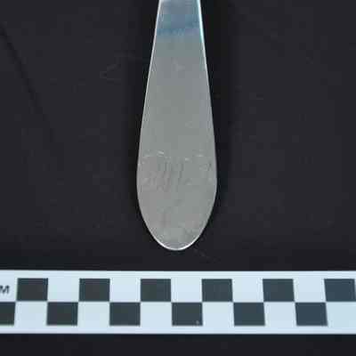 Coin silver spoon with holes