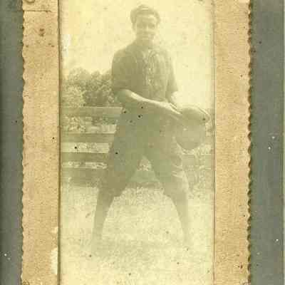 Unidentified African American man playing baseball