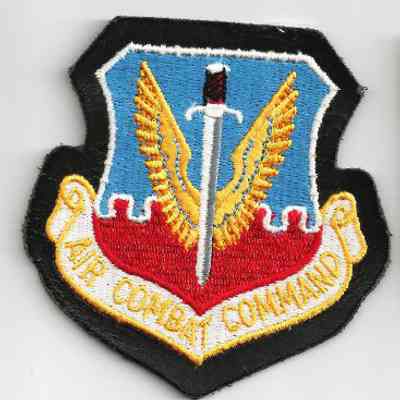 Shield shaped patch with red, white, blue, gold and black colors