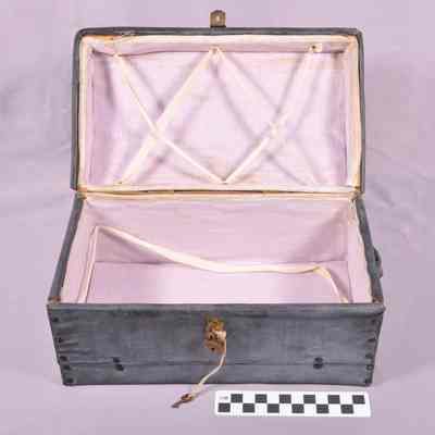 Blue-gray leather covered doll trunk
