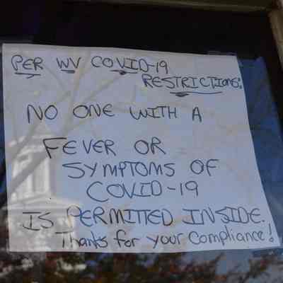 Pandemic sign at LellyBelle Community Cafe