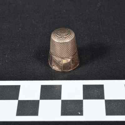 Tapered gold thimble