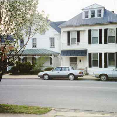 Two houses on Washington Street torn down to make way for a parking lot for Presbyterian Church