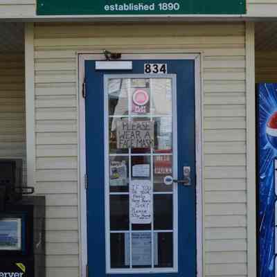 Pandemic signs at Bakerton Store and Post Office