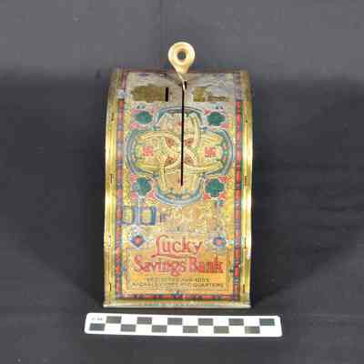 Polychromed tin cash register bank