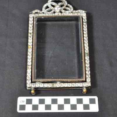 Glass and silver-tone easel-style metal picture frame