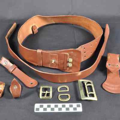 Brown leather belt with heavy brass buckle