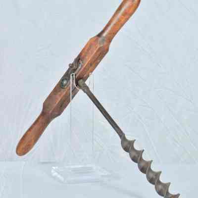 Hand drill with wooden handle and iron bit