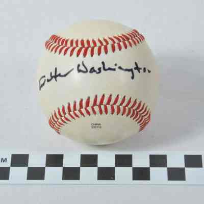 Regulation white baseball signed by Walter Washington