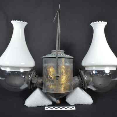Two burner hanging lamp with original white glass chimneys and clear glass globes