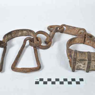 Wrought iron ankle shackle with beam attachment