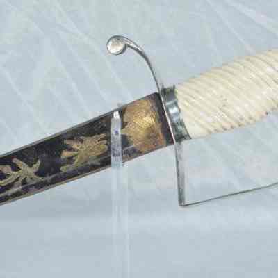 Silver dress sword with scabbard - close up
