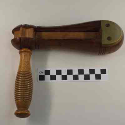 Wood and brass fire alarm