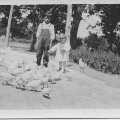 Paul & Mary Milton with chickens - 1930 or 1931