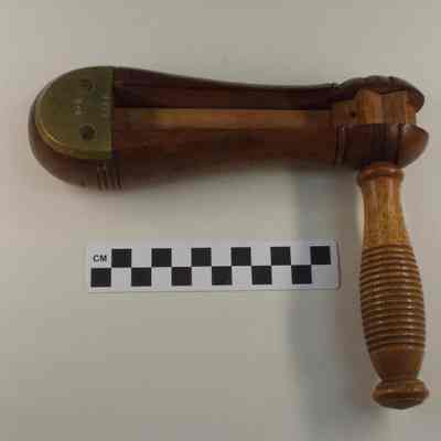 Wood and brass fire alarm