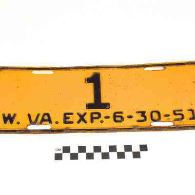 Yellow West Virginia license plate with black digits