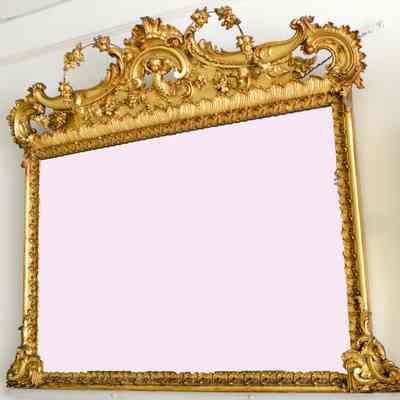 Large, ornately framed mirror