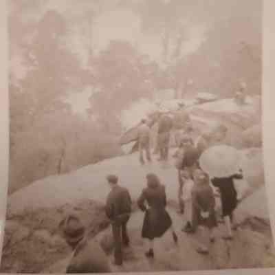 Crowd looking down on 1942 flood