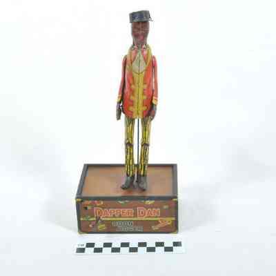 Dapper Dan tin toy
