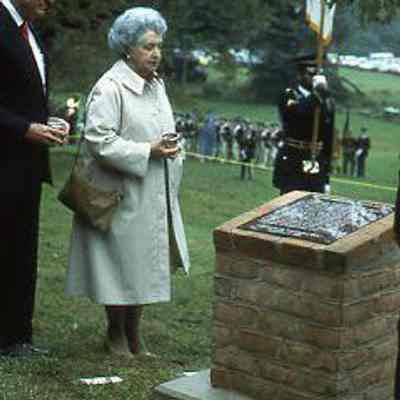 John Wilson, Charles Freeland, Audrey Eagle, John Marsh unveil marker