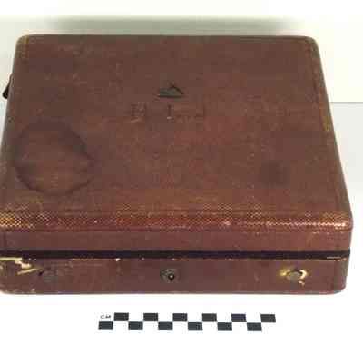 Square, brown-burgundy colored jewelry box