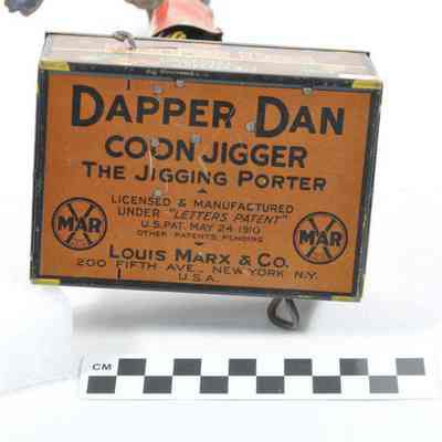 Dapper Dan tin toy