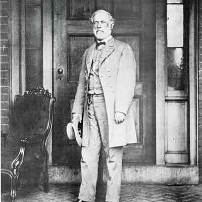 General Robert E. Lee standing in front of his home in Richmond