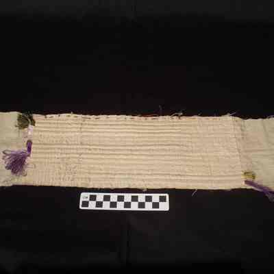 Muslin with seamed ribs holding various colored silk thread