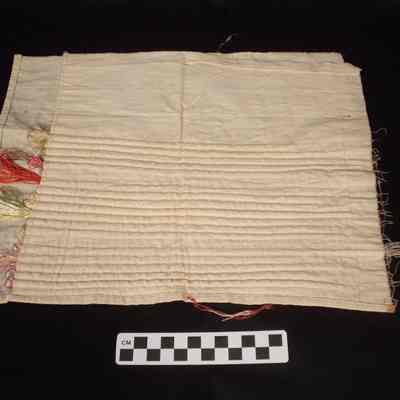 Muslin with seamed ribs holding various colored silk thread