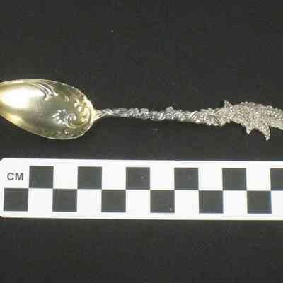 Silver gilt teaspoon with wheat or herb design at end of handle