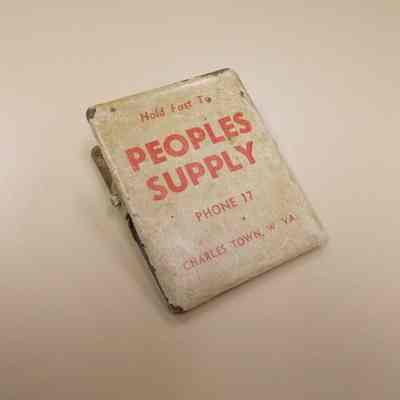 20th century metal clamp or clip advertising Peoples Supply