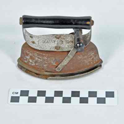 Small two-piece iron containing asbestos