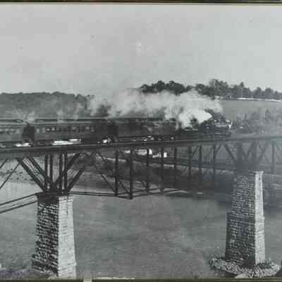 Train traveling east over Potomac River Bridge at Shepherstown