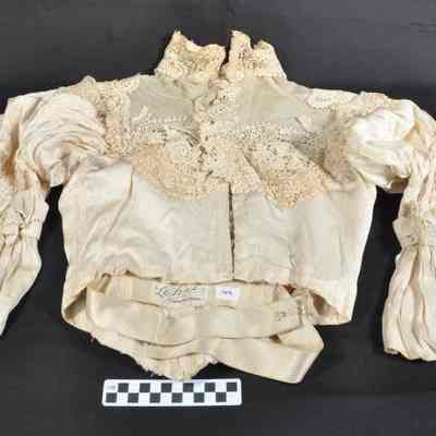 Cream colored satin blouse