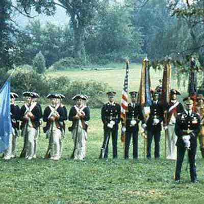 Troops stand at Parade Rest