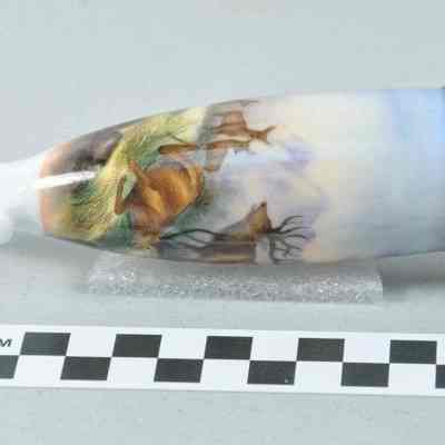 German pipe with white porcelain bowl and flexible stem