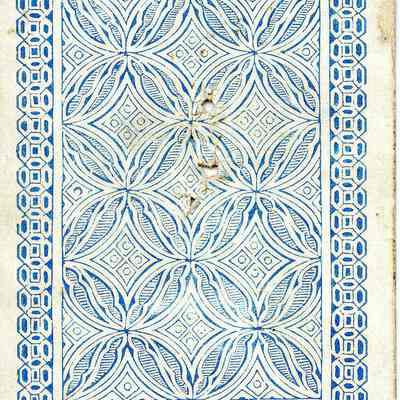 Ace of clubs has three apparent bullet holes