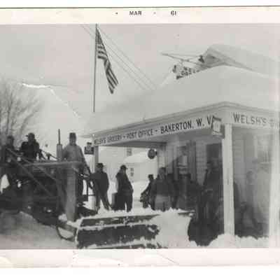 Men posing outside of Welsh's grocery in the snow with a plow, undated: IMG2025.026.001 (41)