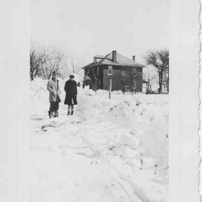Paul & Dice Milton in front of Milton home - Feb. or March, 1947 blizzard