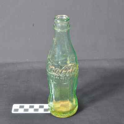 Clear green Coca-Cola bottle