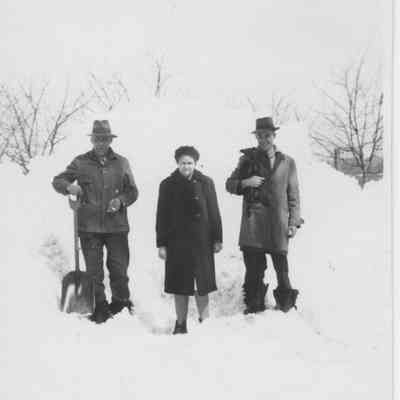 James, Dice, & Paul Milton (Paul is holding dog, Bounce) - 1947 blizzard