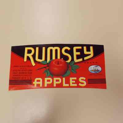 Paper label advertising Rumsey Apples