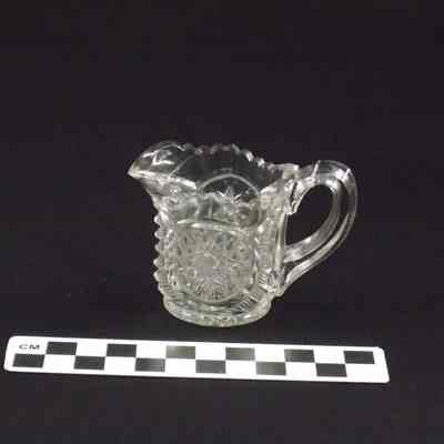 Clear glass pitcher made for child's play