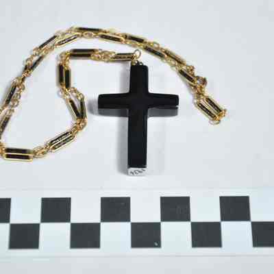 Necklace with black plastic cross
