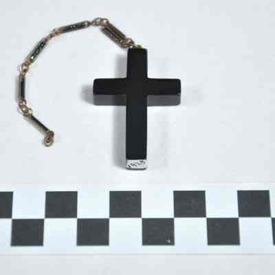 Necklace with black plastic cross