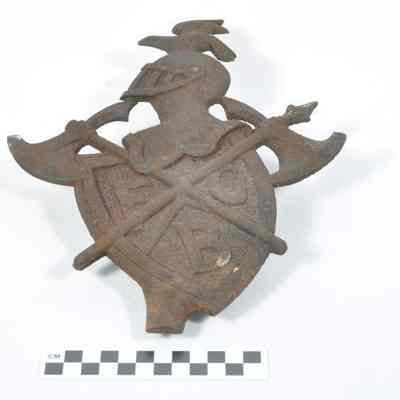 Iron plate with two halberds crossed over a shield