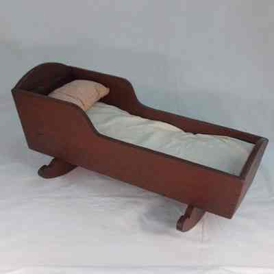 Handmade wooden cradle with handmade mattress, pillow