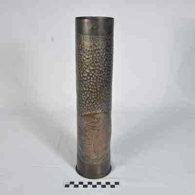 Shell casing with hammer and punch designs
